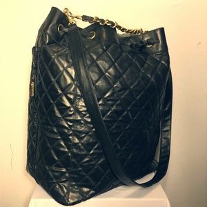 CHANEL Quilted XL CC travel bucket bag Handbag